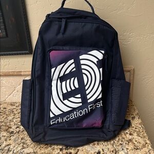 Education First Navy Backpack inside and outside compartments.